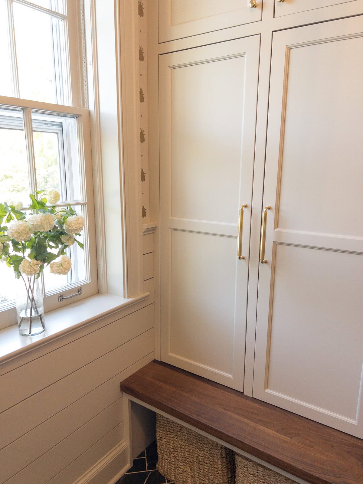Mudroom With Cabinets and Shoe Baskets